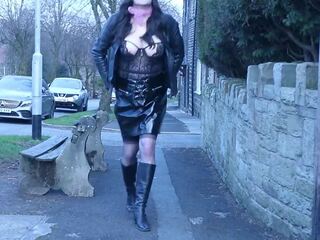 Crossdresser on the streets dressed as a strumpet